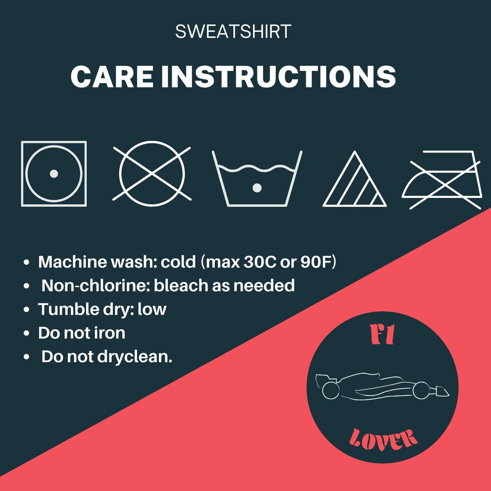 Sweatshirt care instructions: Machine wash cold (max 30C or 90F), Non-chlorine bleach as needed, Tumble dry low, Do not iron, Do not dry clean.  Icons depict these instructions. Dark teal and coral color scheme.  F1 Lover logo is displayed.