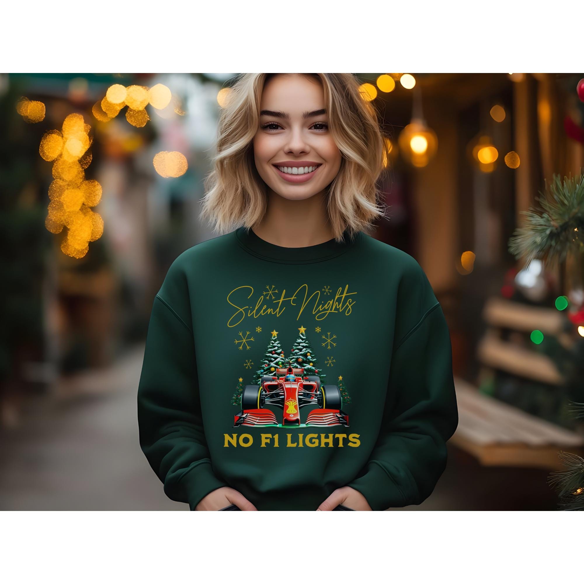 Dark green Christmas sweatshirt featuring a Formula 1 race car between two Christmas trees.  The text on the sweatshirt says, &#39;Silent Nights, NO F1 LIGHTS&#39; in gold lettering. The design includes snowflakes and stars.
