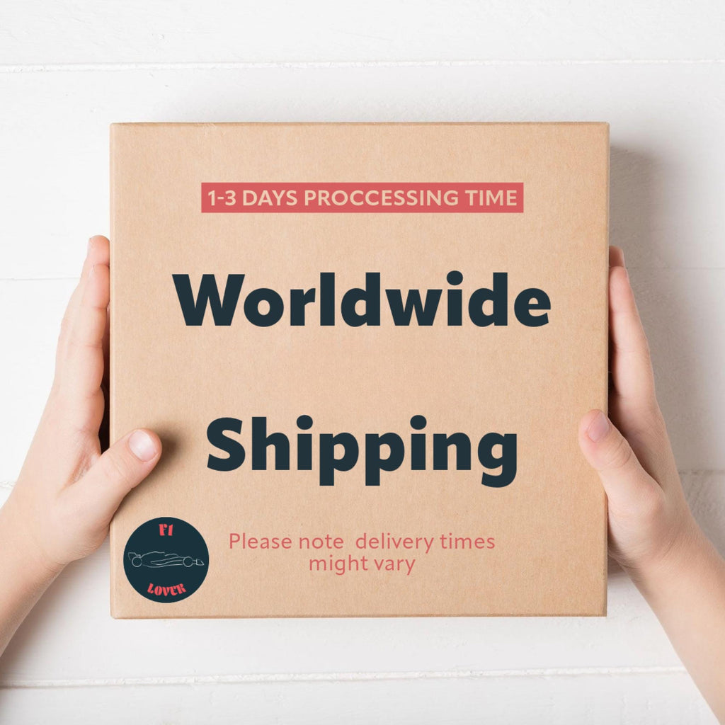 A brown cardboard box with the text &#39;Worldwide Shipping&#39; in black letters. The text &#39;1-3 Days Processing Time&#39; is in red letters. The text &#39;Please note delivery times might vary&#39; is in red letters. A sticker with a red heart and the text &#39;F1 Lover&#39; is on the bottom left corner of the box.