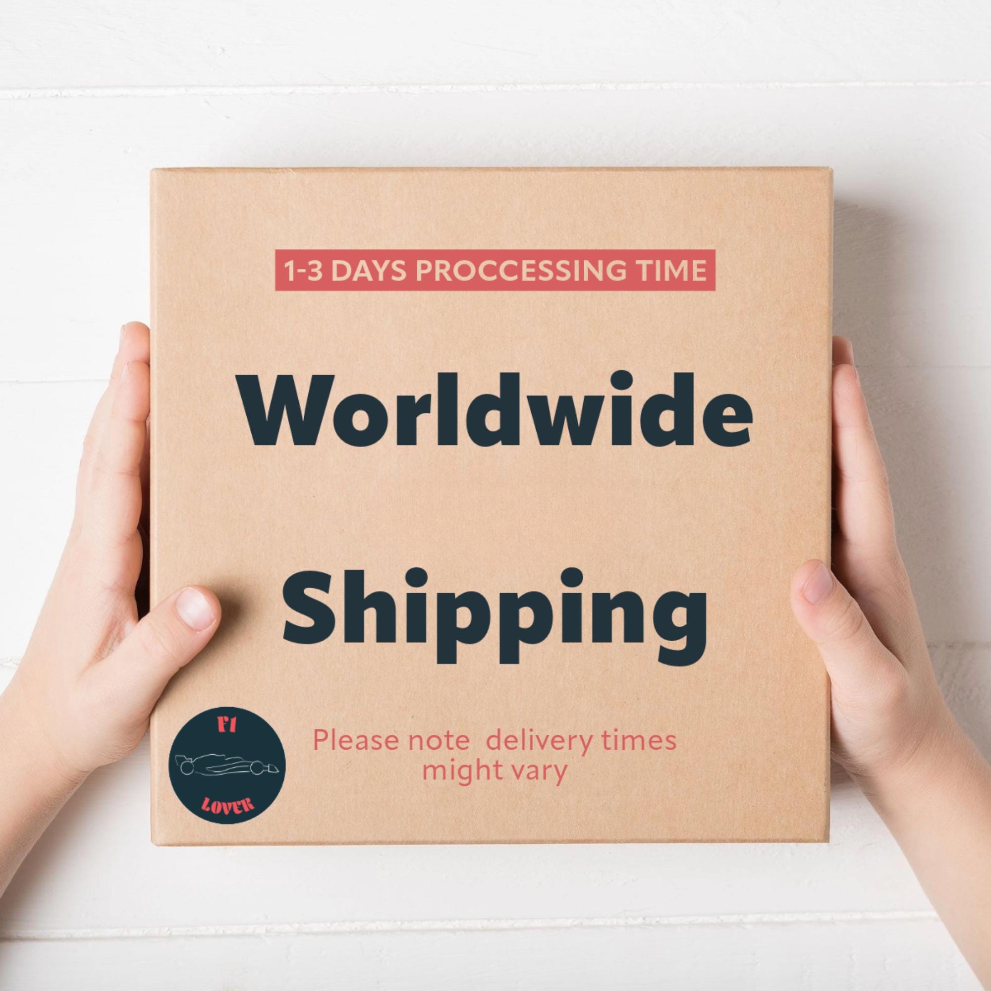 A brown cardboard box with the text &#39;Worldwide Shipping&#39; in black letters. The text &#39;1-3 Days Processing Time&#39; is in red letters. The text &#39;Please note delivery times might vary&#39; is in red letters. A sticker with a red heart and the text &#39;F1 Lover&#39; is on the bottom left corner of the box.
